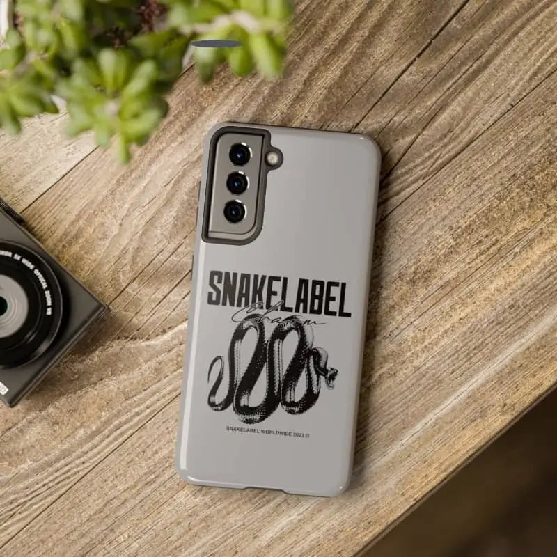 Snake Tough Phone Cases with 2 - Layer Protection & Wireless Charging Compatibility snake - label
