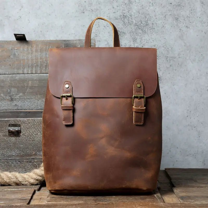 Urban Backpack with Top Layer Cowhide Material & Multiple Compartments snake - label