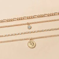 Chunky Gold Pendant Necklace with Layered Coin Design - snake - label