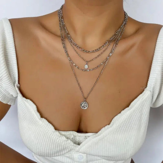Chunky Gold Pendant Necklace with Layered Coin Design snake - label
