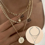 Chunky Gold Pendant Necklace with Layered Coin Design - snake - label