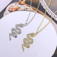 Diamond Snake Pendant with Double Color Detailing and Rhinestone Embellishments - snake - label