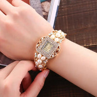 Ladies Bracelet Watch with Light Gold Finish and Swiss ETA Quartz Movement snake - label