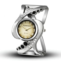 Ladies Bracelet Watch: Quartz Movement, Stainless Steel Case, Elegant Design snake - label