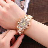 Ladies Bracelet Watch with Light Gold Finish and Swiss ETA Quartz Movement - snake - label