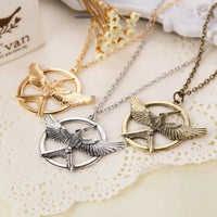 Mockingjay Animal Necklace with Zodiac Pendant & Geometric Design snake - label