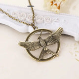 Mockingjay Animal Necklace with Zodiac Pendant & Geometric Design snake - label