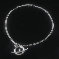 Sleek Silver Snake Collar Pendant with Gold - Plated Details snake - label