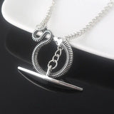 Sleek Silver Snake Collar Pendant with Gold - Plated Details snake - label