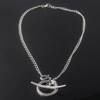 Sleek Silver Snake Collar Pendant with Gold - Plated Details - snake - label