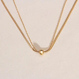 Snake Bone Round Necklace with Celestial Constellation - Stainless Steel Beauty in Gold snake - label