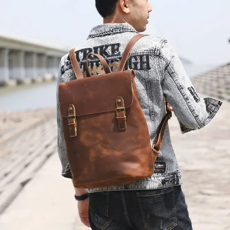 Urban Backpack with Top Layer Cowhide Material & Multiple Compartments snake - label